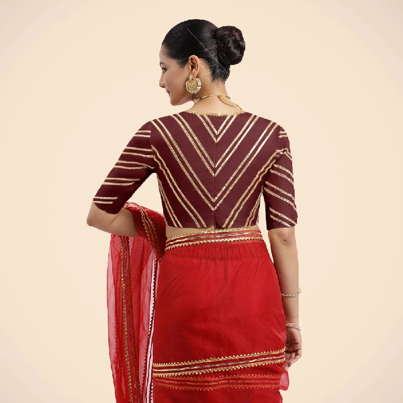 Navya x Tyohaar | Burgundy Elbow Sleeves FlexiFit™ Saree Blouse with Plunging V Neckline with Tasteful Golden Gota Lace