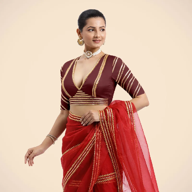 Navya x Tyohaar | Burgundy Elbow Sleeves FlexiFit™ Saree Blouse with Plunging V Neckline with Tasteful Golden Gota Lace