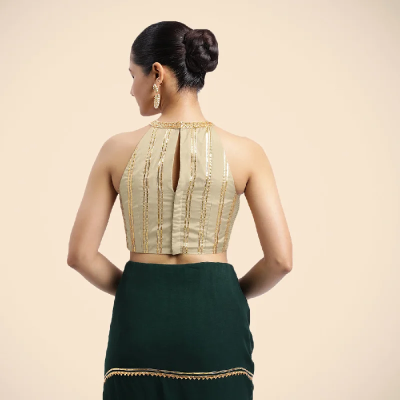 Zubeida x Tyohaar | Cream Halterneck FlexiFit™ Saree Blouse with Elegant Golden Gota Embellishment on Princess Line