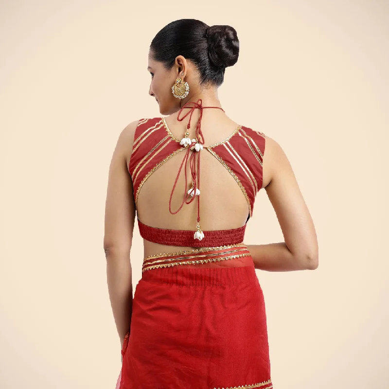 Ahana x Tyohaar | Crimson Red Sleeveless FlexiFit™ Saree Blouse with Plunging Neckline and Back Cut Out with Tasteful Golden Gota Lace Embellishment