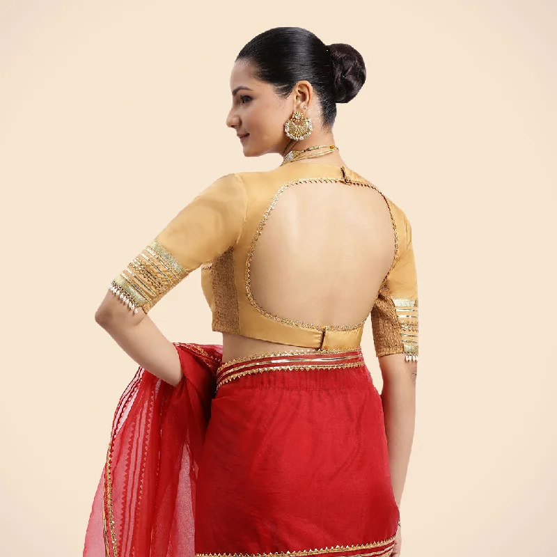 Farheen x Tyohaar | Gold Embellished Elbow Sleeves FlexiFit™ Saree Blouse with Zero Neck with Back Cut-Out and Golden Gota Embellishment