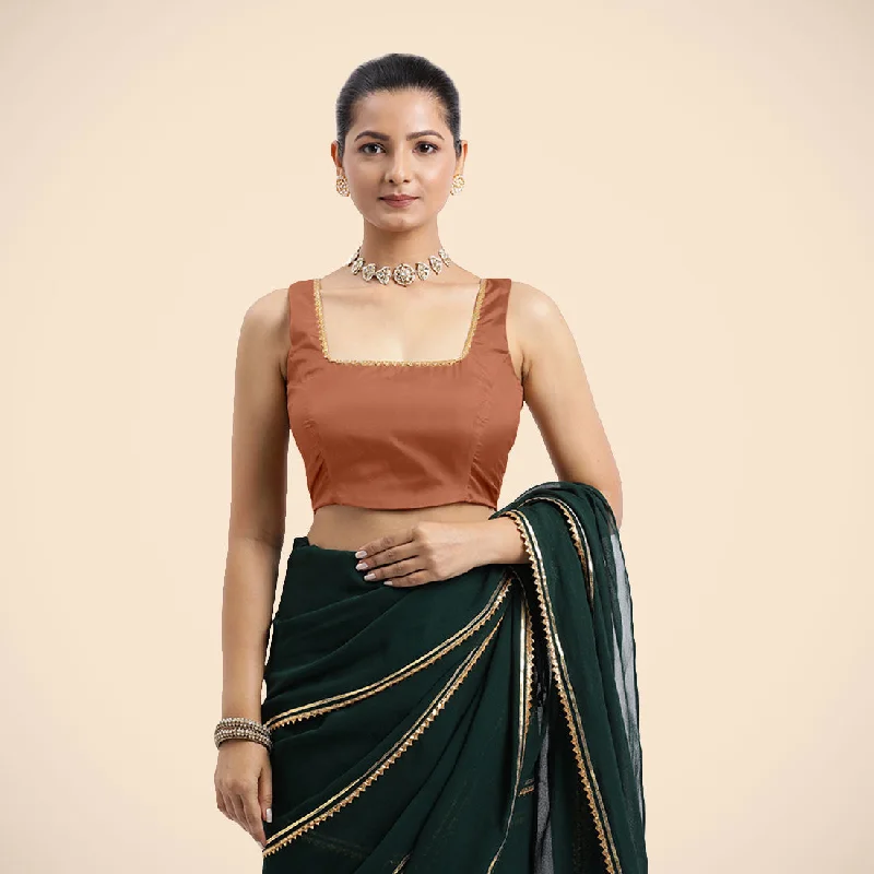 Tanvi x Tyohaar | Metallic Copper Sleeveless FlexiFit™ Saree Blouse with Square Front Neck and Deep Back with Dori and Golden Gota Embellishment